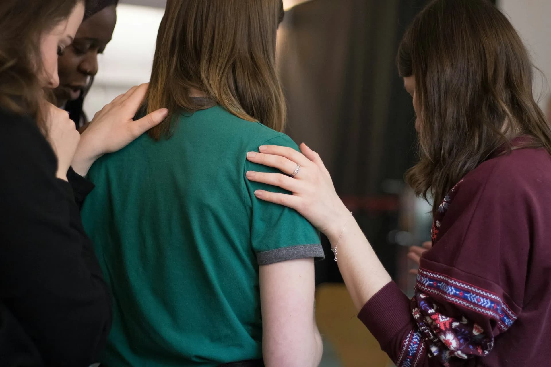 women praying together